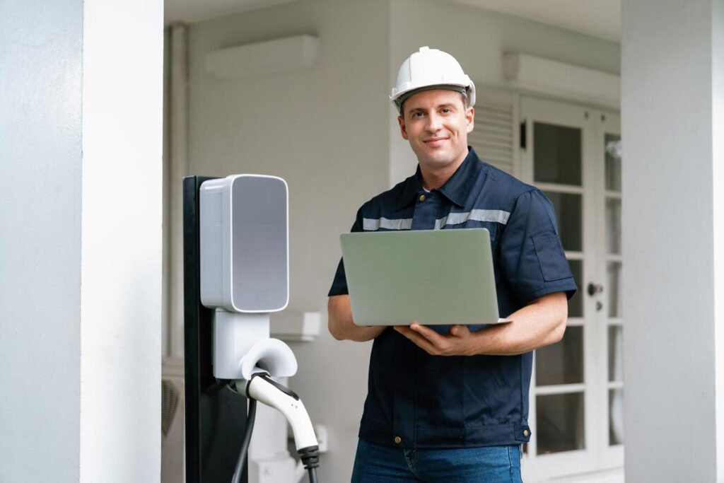 Electrician Installing EV - Electric Vehicle Charger