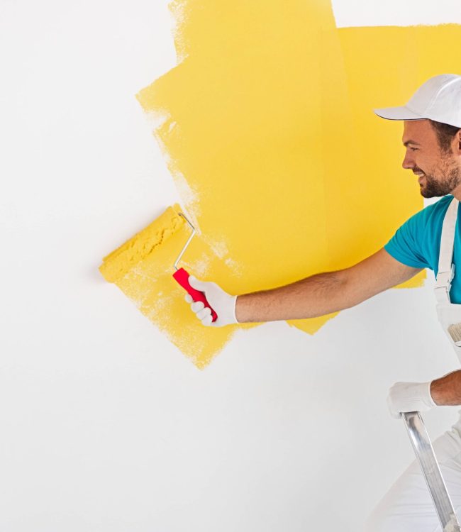 Painter Yellow paint AdobeStock_354875354